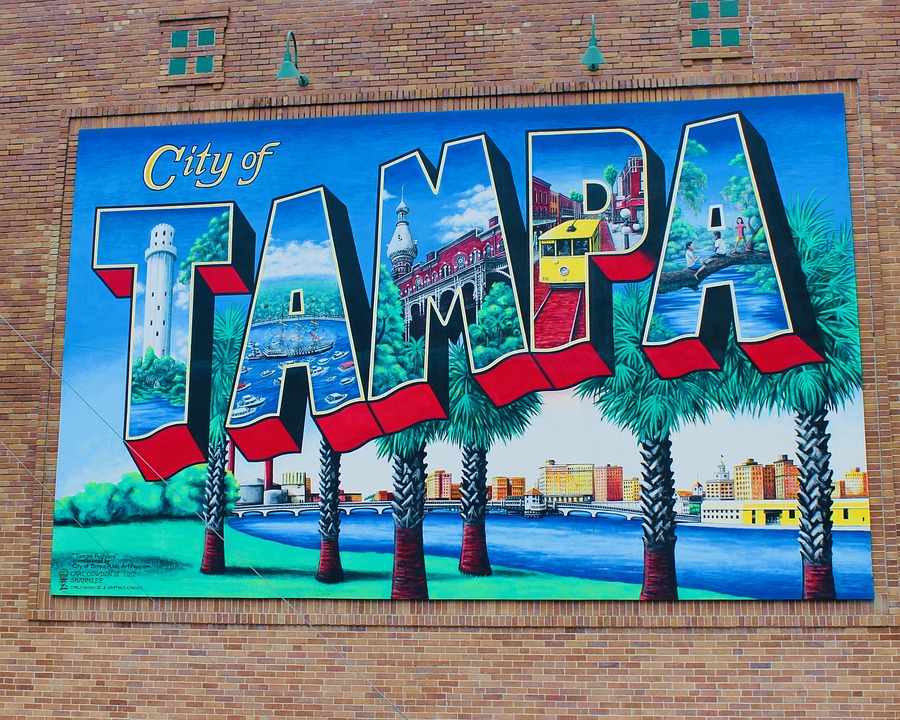 Tampa postcard art on a brick wall