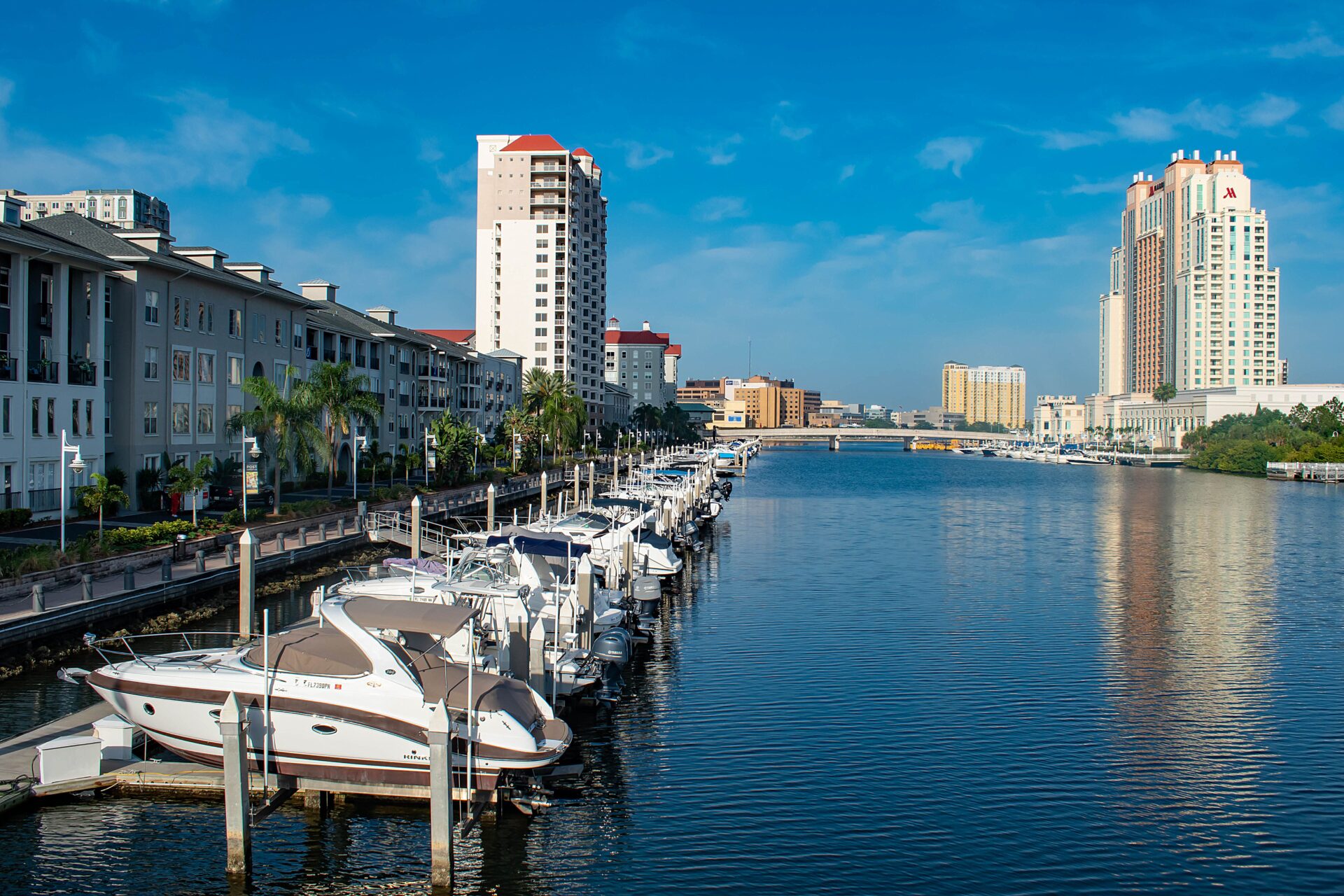 Tampa Luxury boats in Harbour Island dockside on lightblue sky background